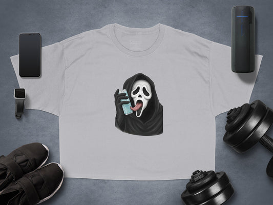 Grey t-shirt with Ghostface drinking from a can with its tongue out.