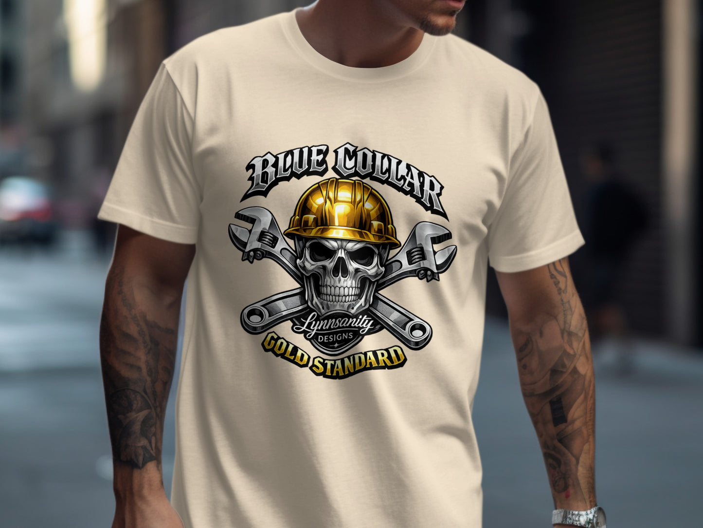 Skull wearing hard hat with wrenches, "Blue Collar Gold Standard" text.