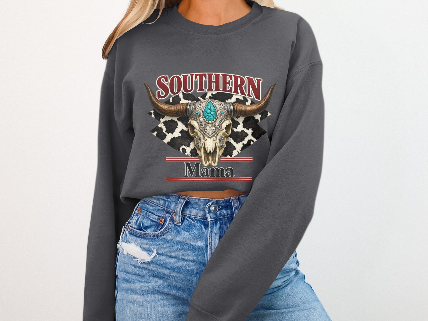 Dark grey sweatshirt with Southern Mama text and cow skull graphic.