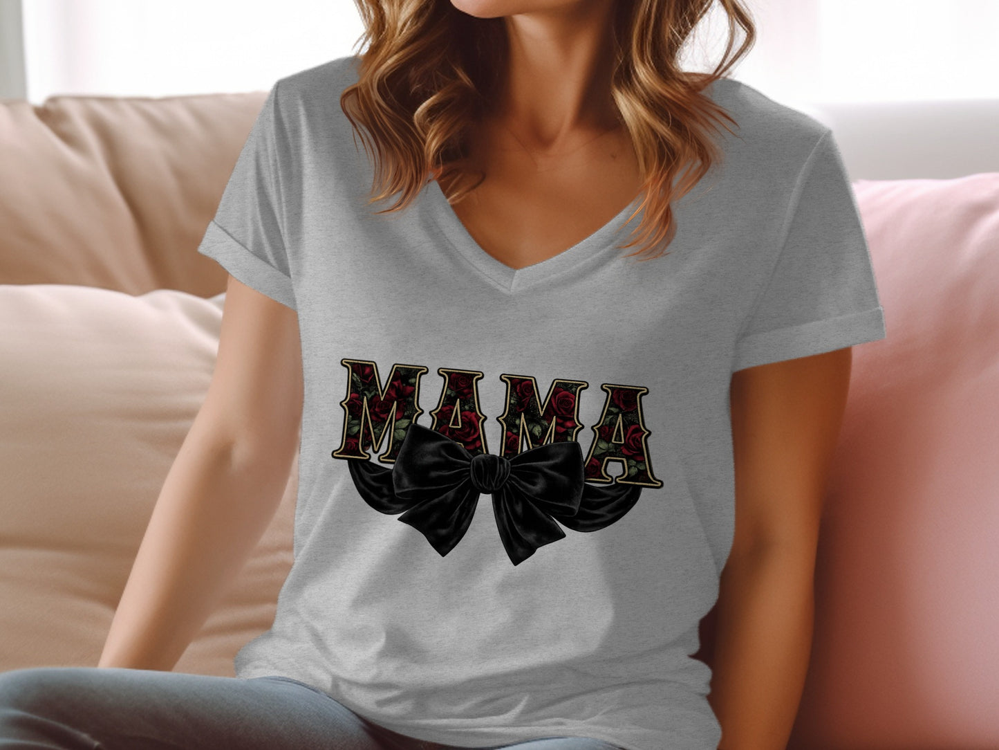 Gray v-neck t-shirt with "MAMA" text and black bow graphic.