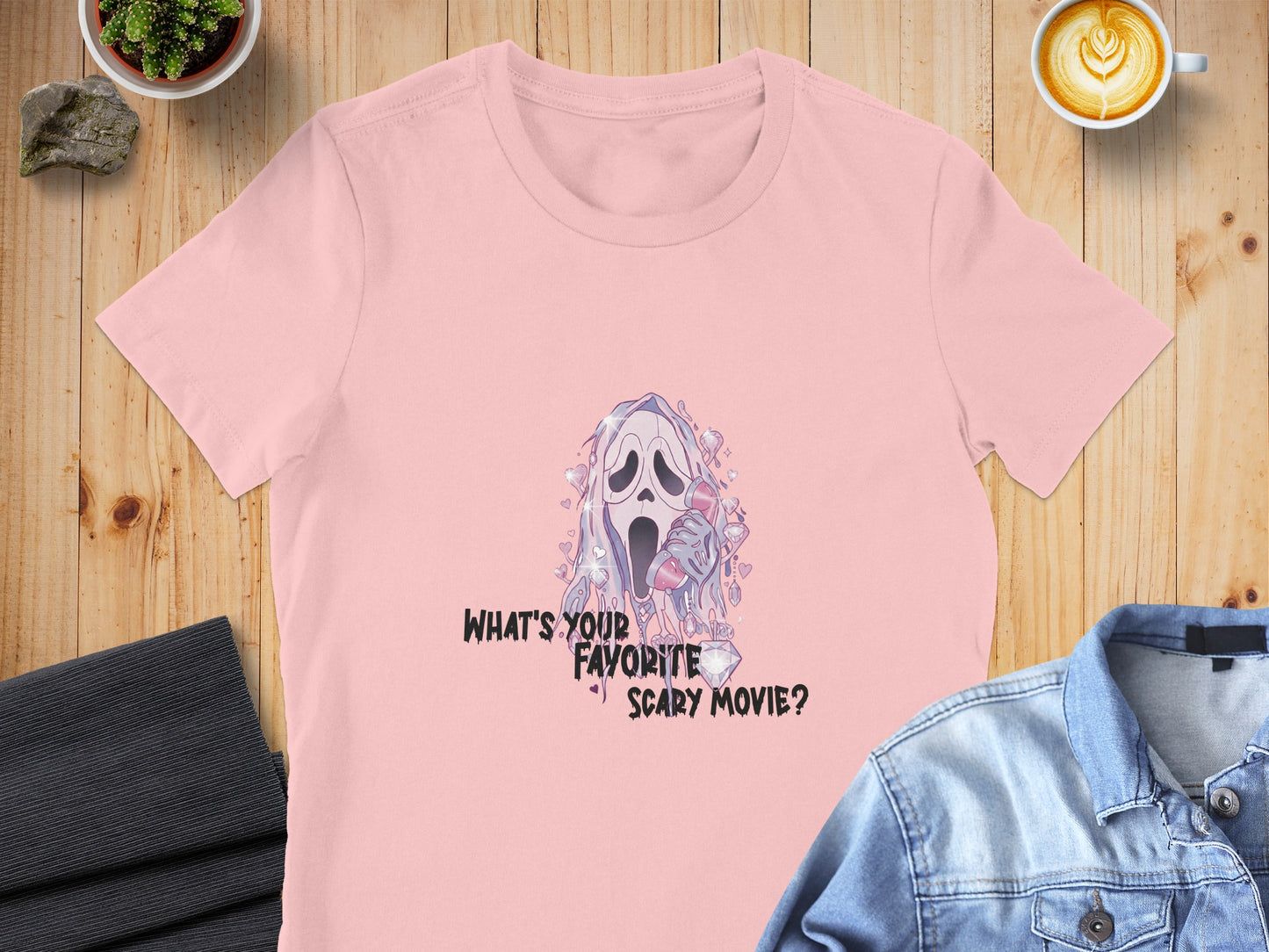 Pink t-shirt with "What's your favorite scary movie?" Ghostface graphic.