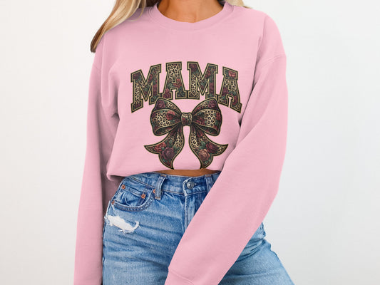 Pink cropped sweatshirt with "MAMA" text and a floral and leopard print bow.