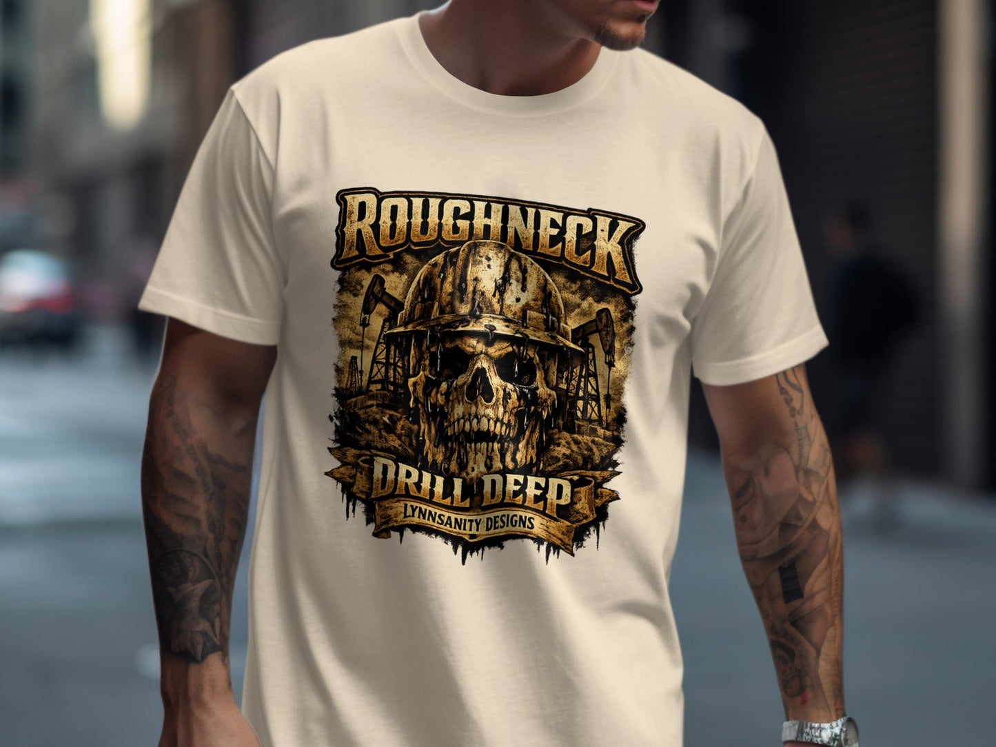 Skull wearing hard hat with "Roughneck Drill Deep" text on a beige t-shirt.
