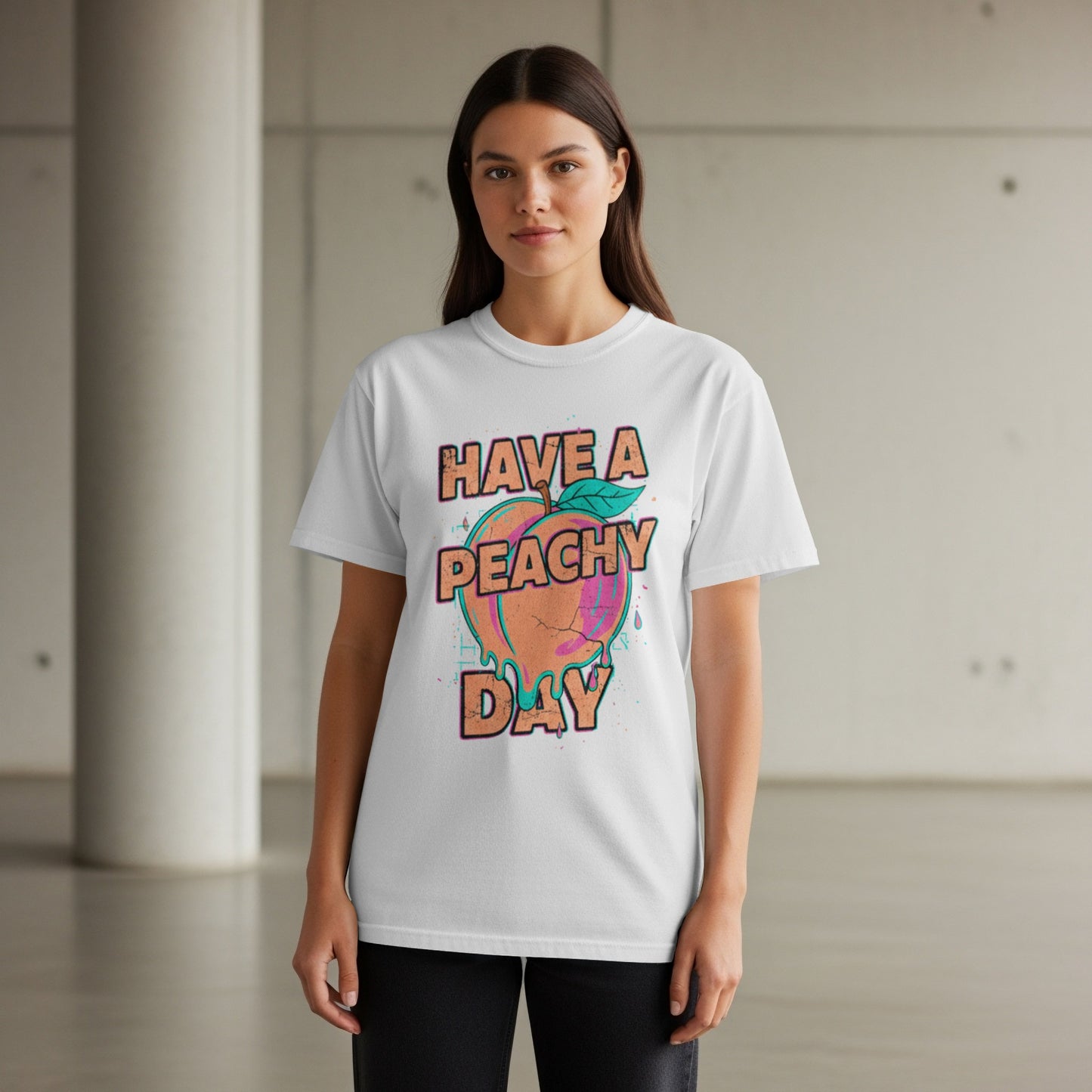 White t-shirt with a dripping peach and "Have a peachy day" text.