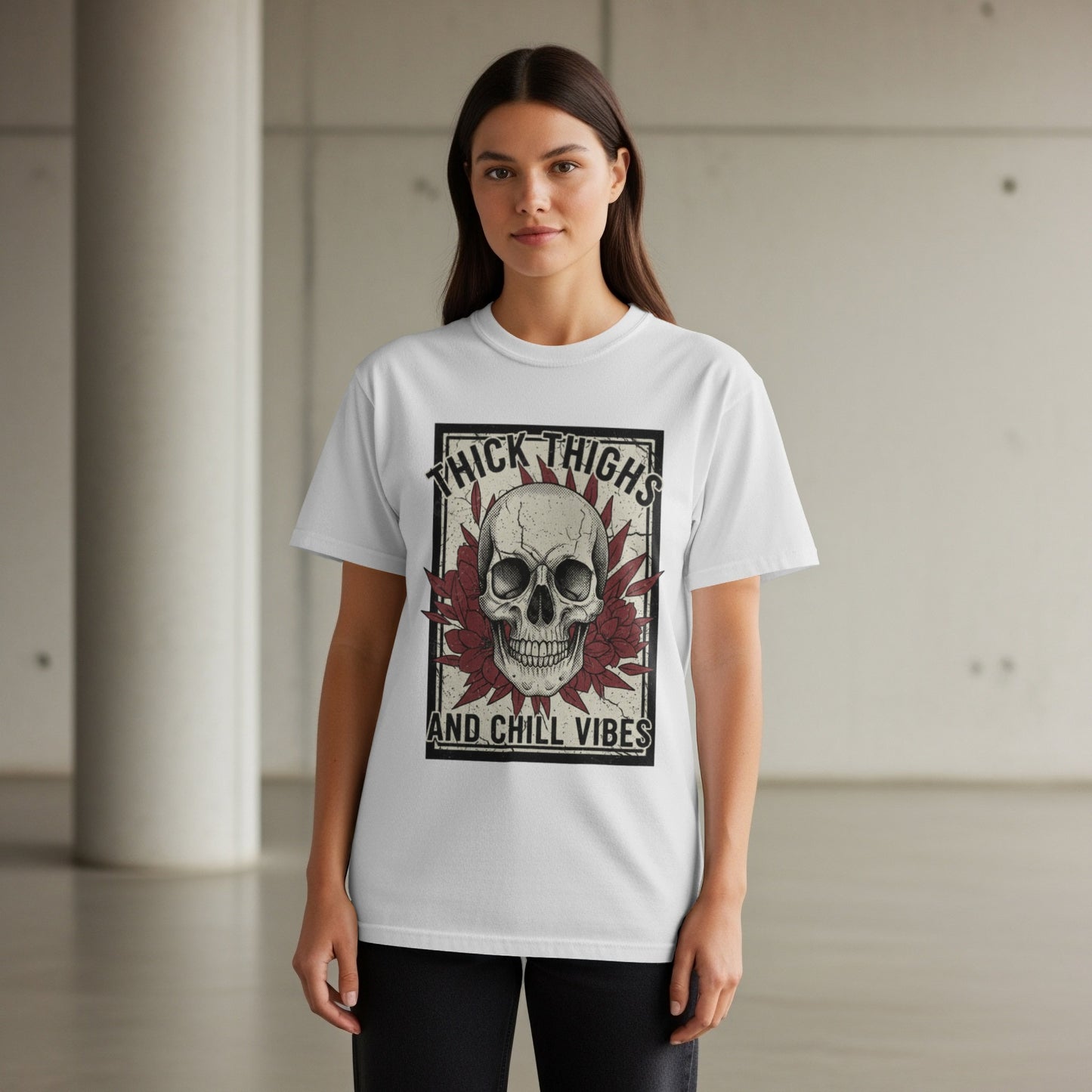 White t-shirt with skull and roses graphic: "Thick Thighs And Chill Vibes".