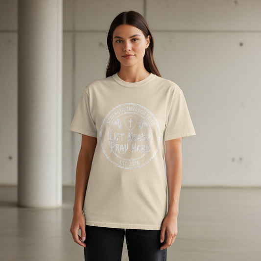 Light beige t-shirt with "Strength Through Faith Lift Heavy Pray Hard" graphic.