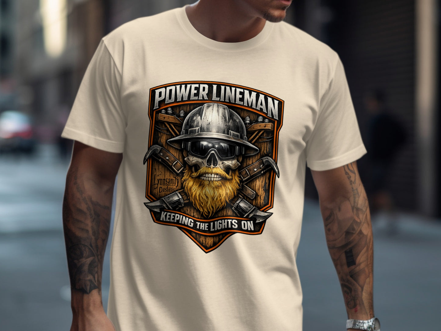 Power lineman shield graphic with crossed hammers and text.