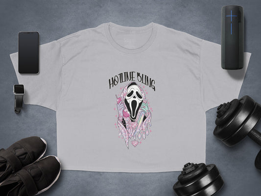 Ghostface graphic t-shirt with pink hearts and diamonds.