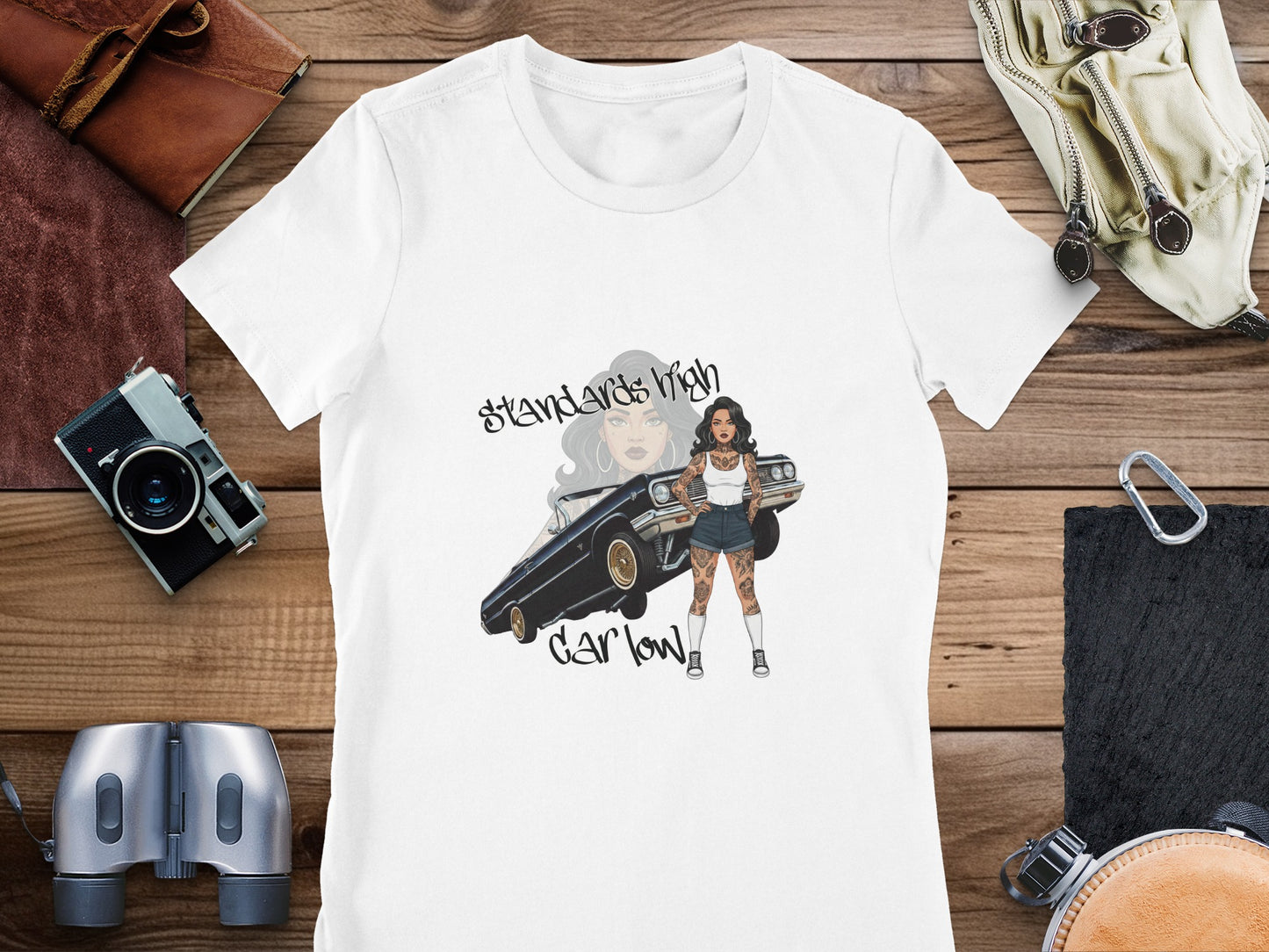 T-shirt with graphic of tattooed woman and lowrider car, text "Standards High Car Low".