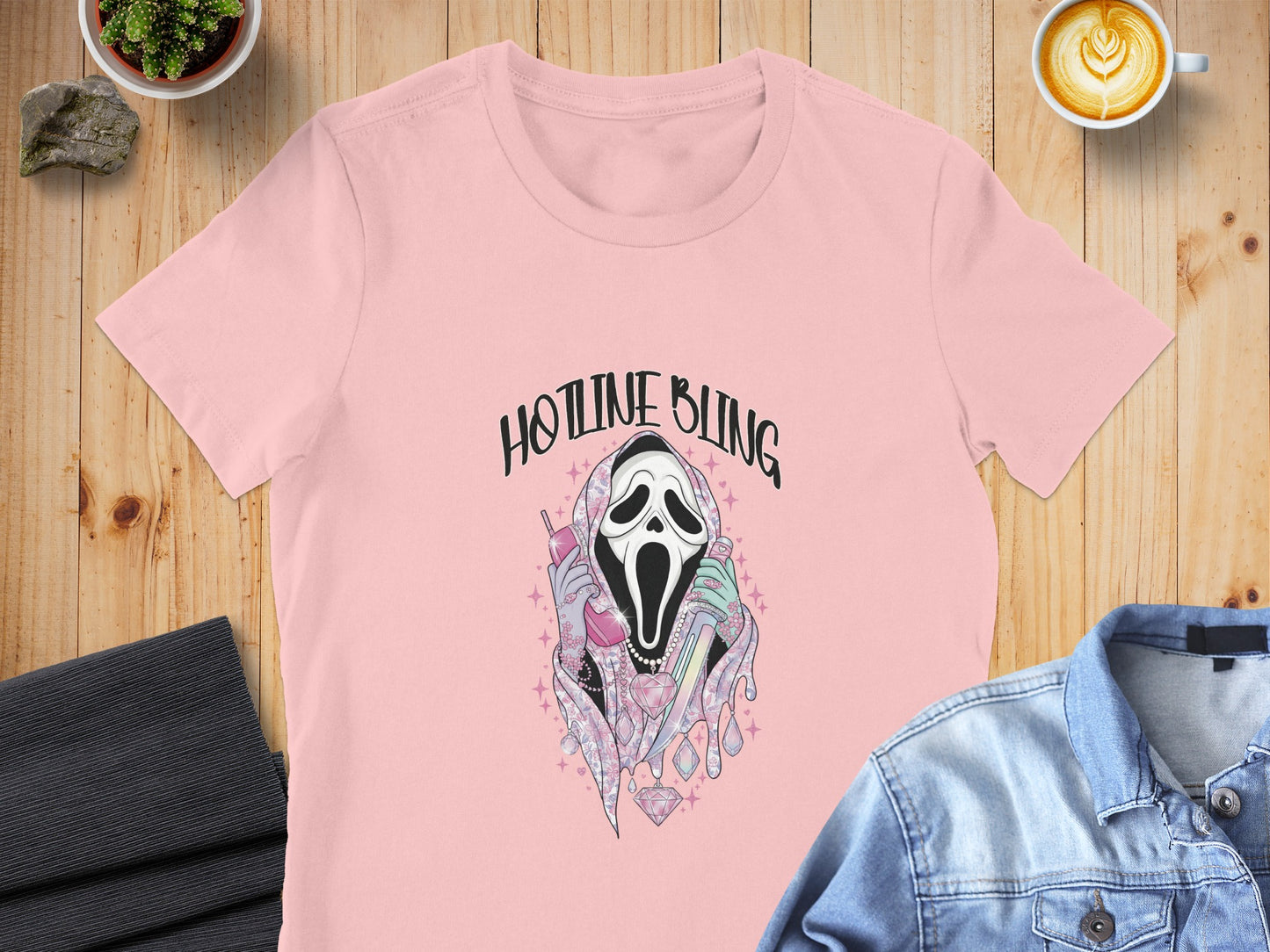 Pink t-shirt with "Hotline Bling" text and ghost calling on a phone.