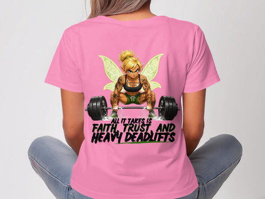 Pink t-shirt with fairy lifting weights and motivational text.