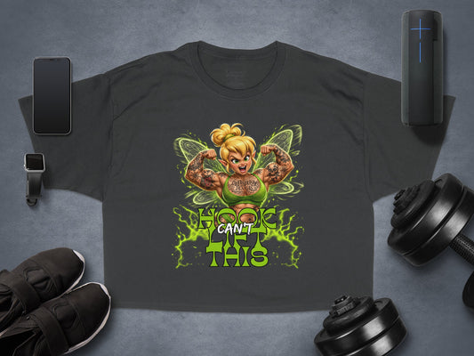 T-shirt graphic of muscular Tinkerbell with "I CAN'T" tattooed on arms.