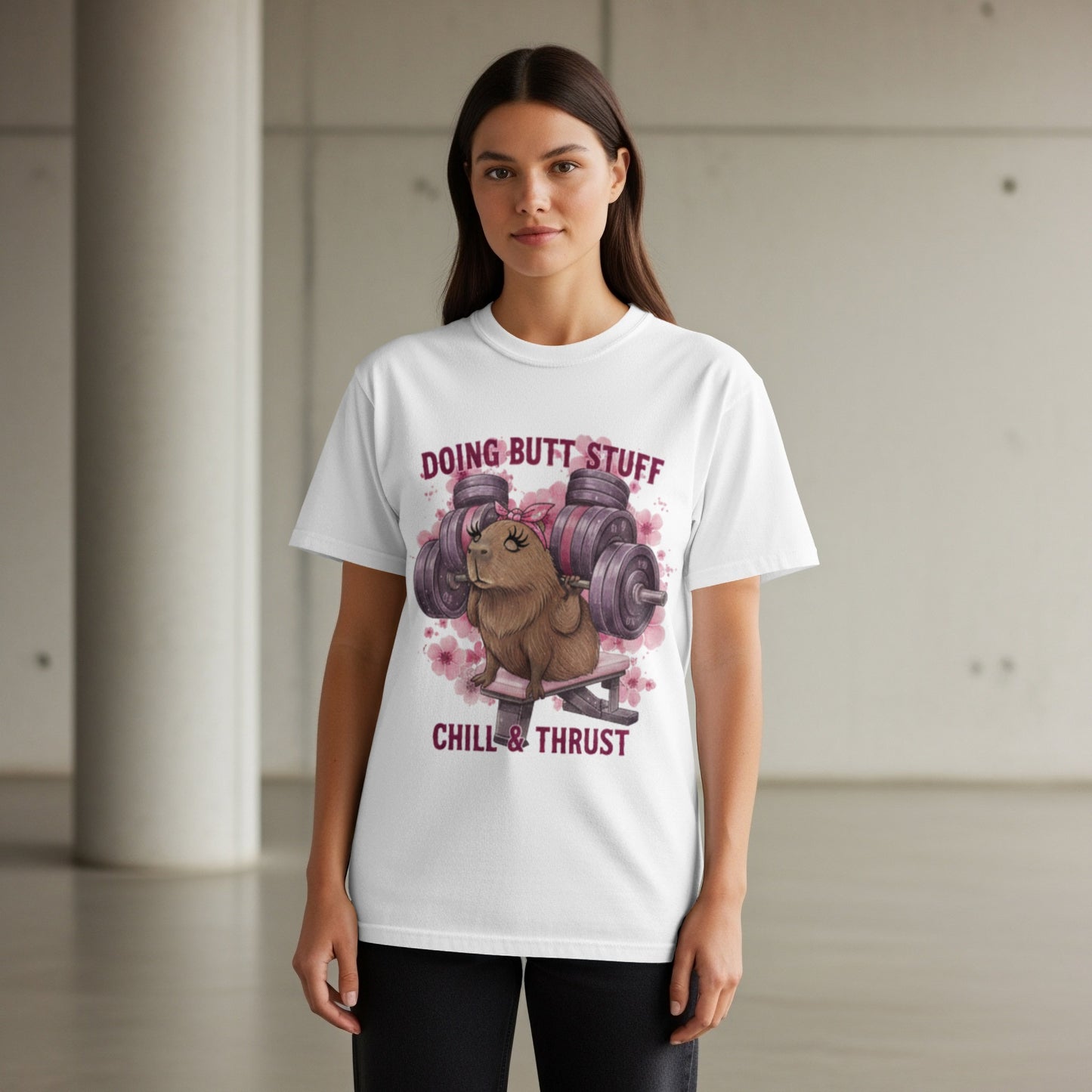 White t-shirt with a capybara lifting weights, text reads "DOING BUTT STUFF CHILL & THRUST".