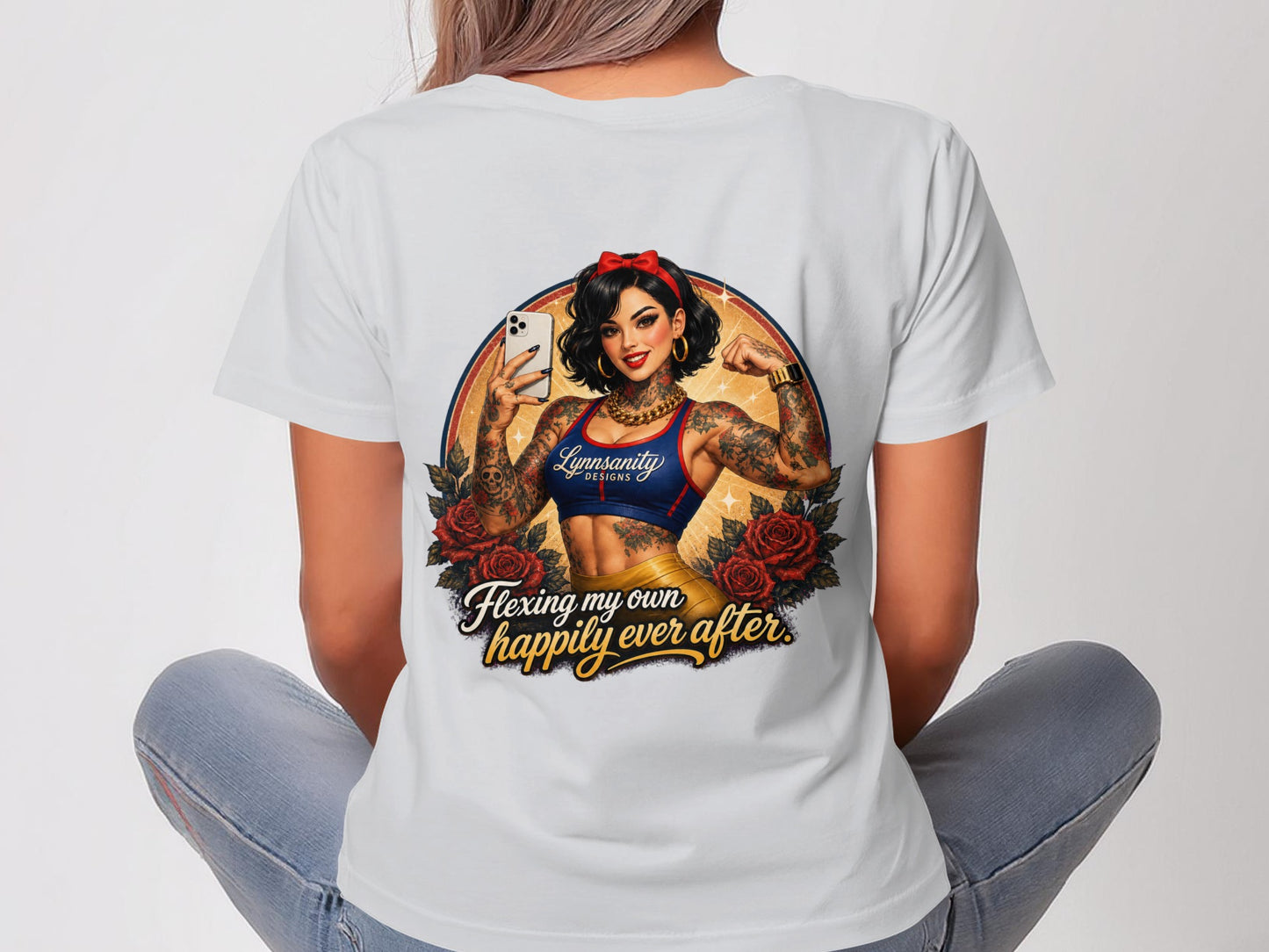 Woman in white t-shirt with cartoon of muscular woman flexing, text "Happily Ever After."
