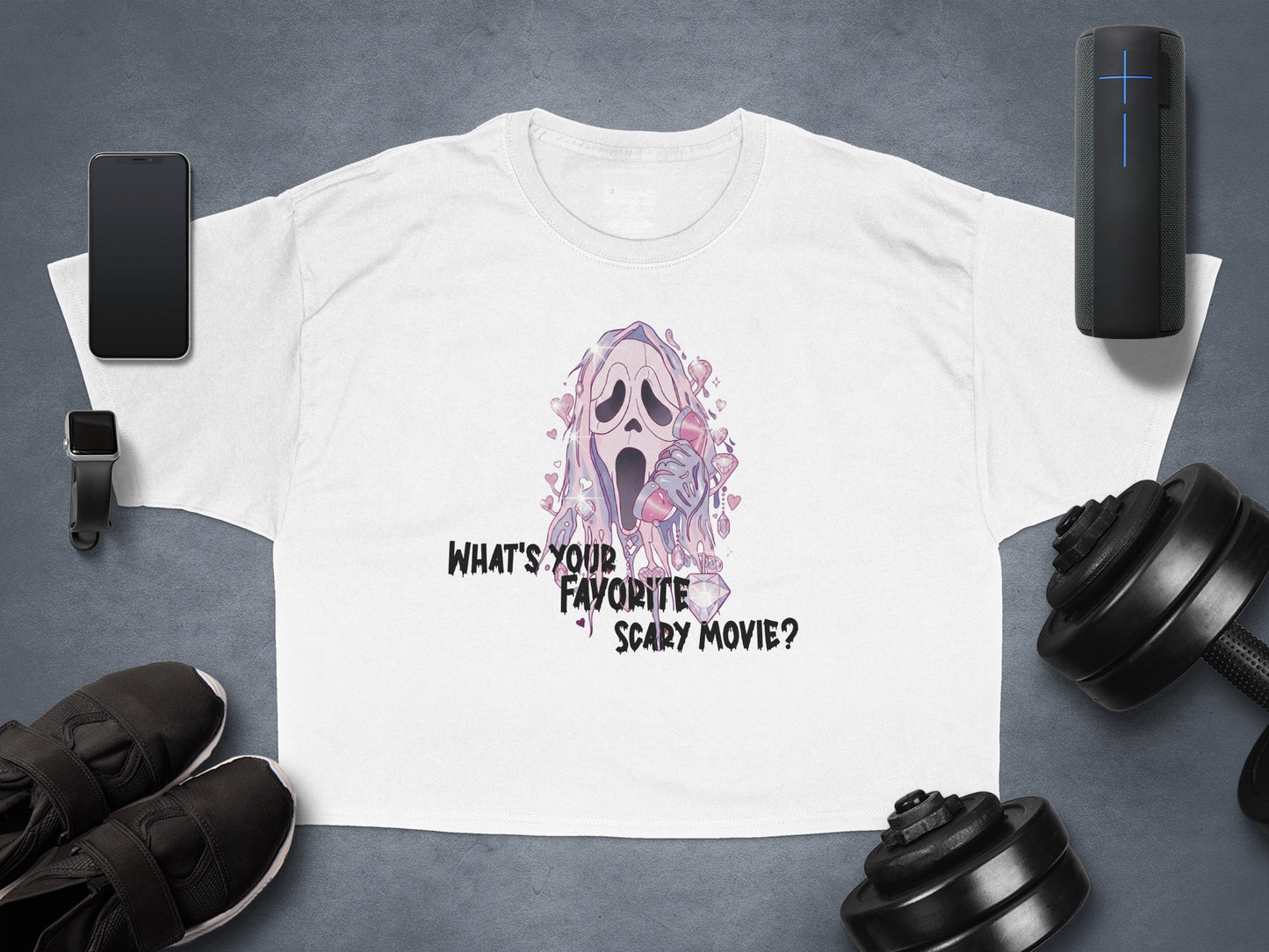 Ghostface from Scream asking "What's Your Favorite Scary Movie?" on a white t-shirt.