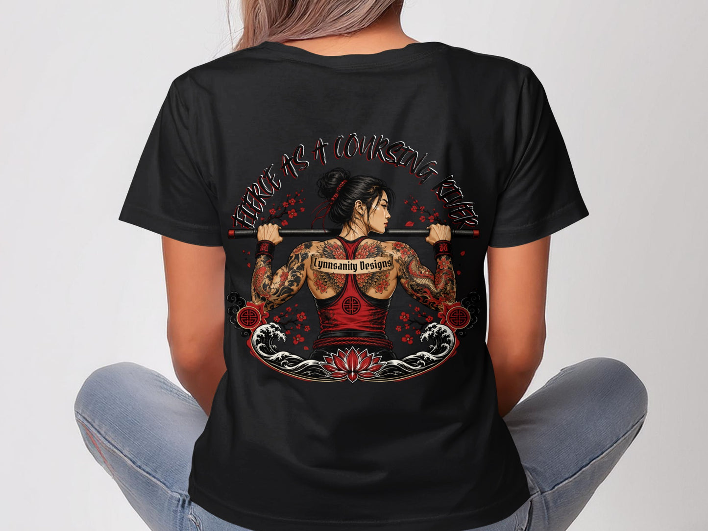 Woman in black t-shirt with back tattoo design and "Fierce as a Courting Killer" text.
