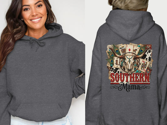 Dark grey hoodie with skull, playing cards, and floral graphics on back.