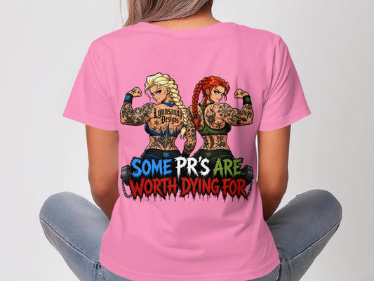 Two tattooed women flex muscles, wearing shirts with "SOME PR'S ARE WORTH DYING FOR".