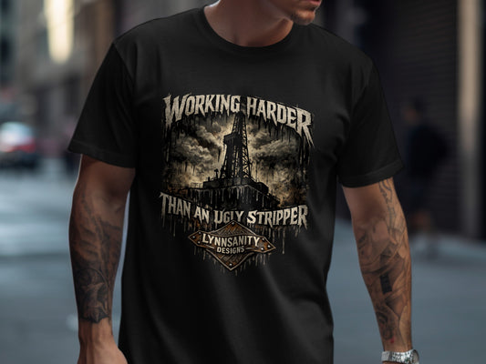 T-shirt with "Working Harder Than An Ugly Stripper" text and drill rig graphic.