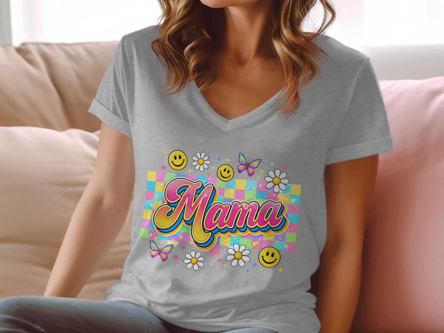 Grey V-neck t-shirt with colorful "Mama" text, butterflies, daisies, and smiley faces.