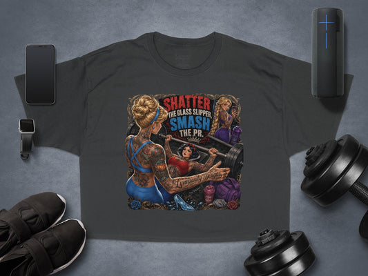 T-shirt with tattooed Snow White lifting weights, text "Shatter the Glass Slipper. Smash the PR."