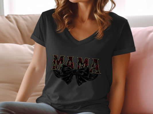 Black v-neck t-shirt with "MAMA" in floral print and a bow.