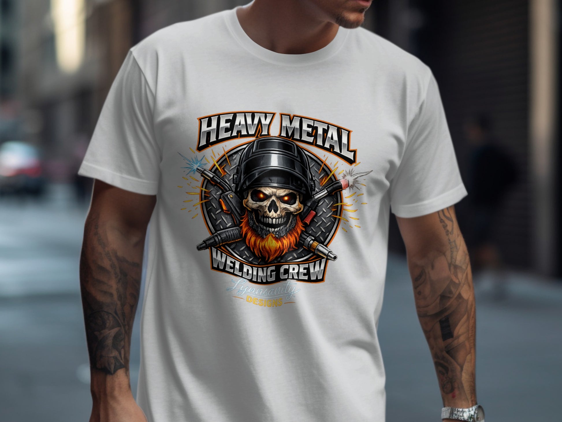 White t-shirt with a "Heavy Metal Welding Crew" graphic featuring a skull and welding torches.