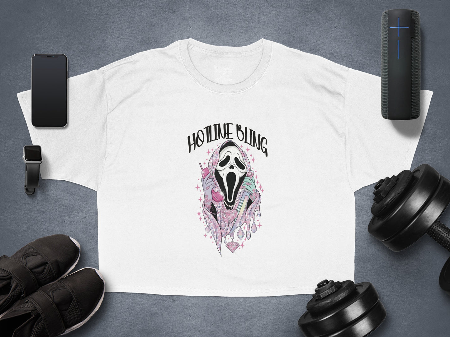 White t-shirt with "Hotline Bling" ghost graphic and pastel accents.