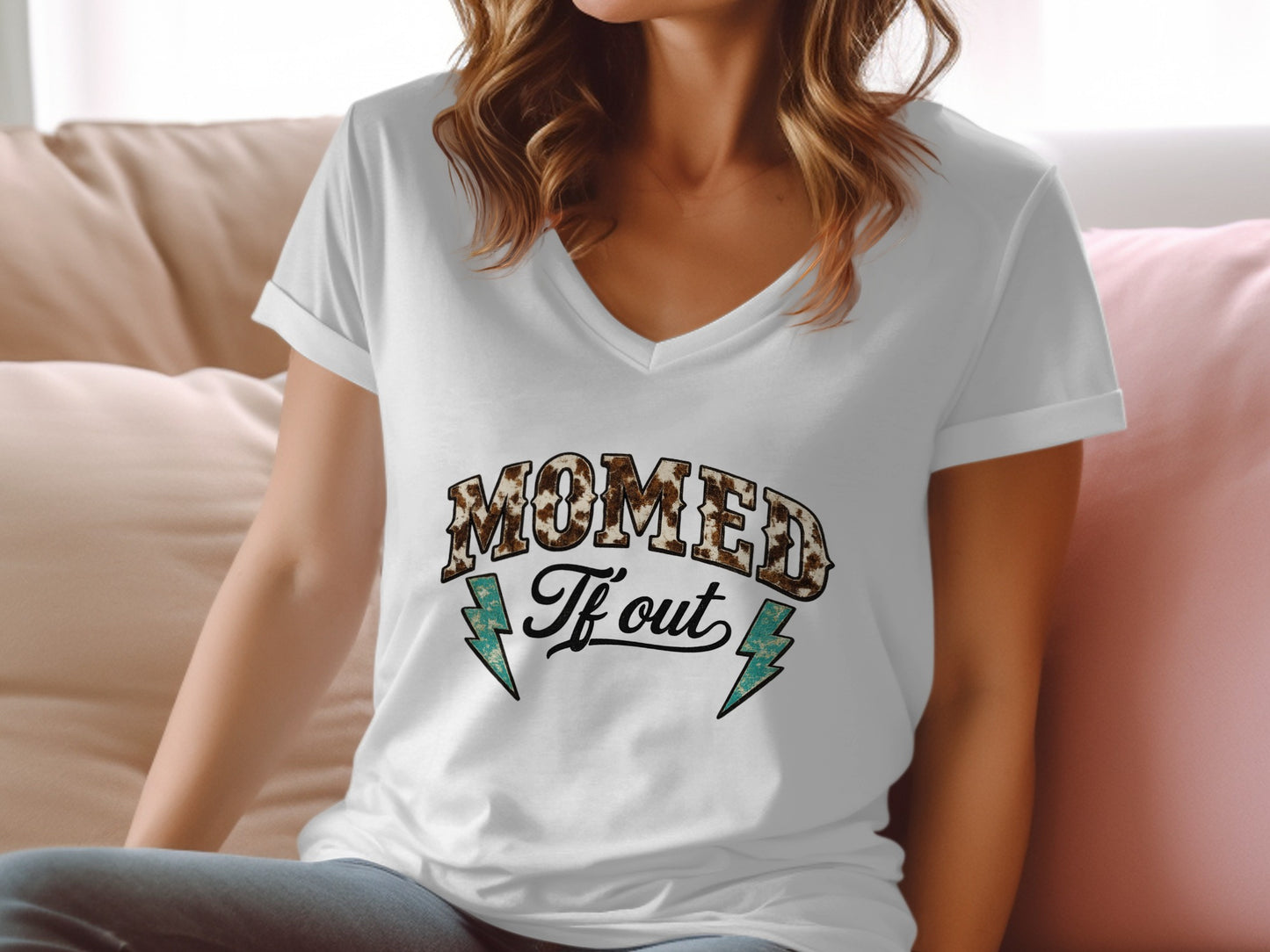 White v-neck t-shirt with "Mom Life" text and lightning bolts.