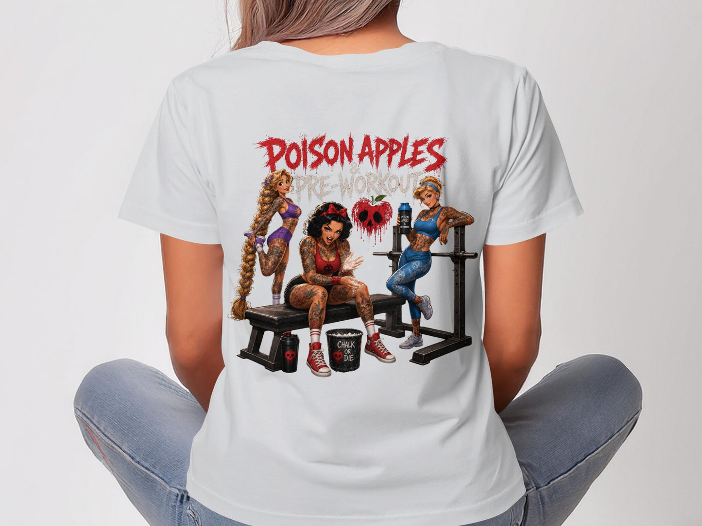Woman wearing white t-shirt with "Poison Apples Pre-Workout" and cartoon women at gym.