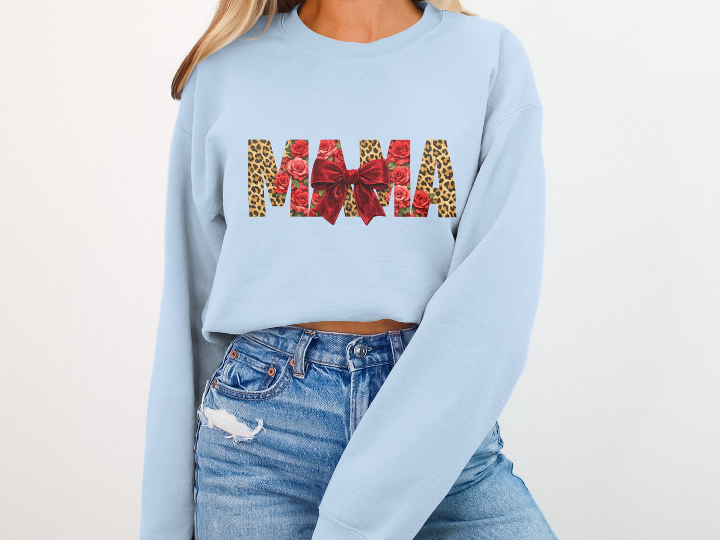 Light blue sweatshirt with "MAMA" in leopard print, roses, and a red bow.