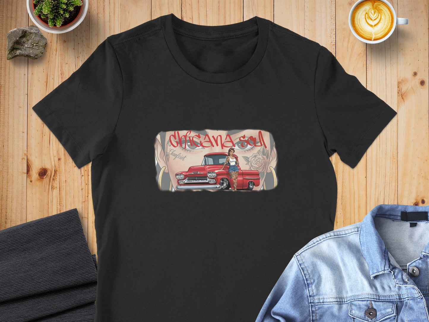 Black t-shirt with graphic of a woman leaning against a red classic truck.