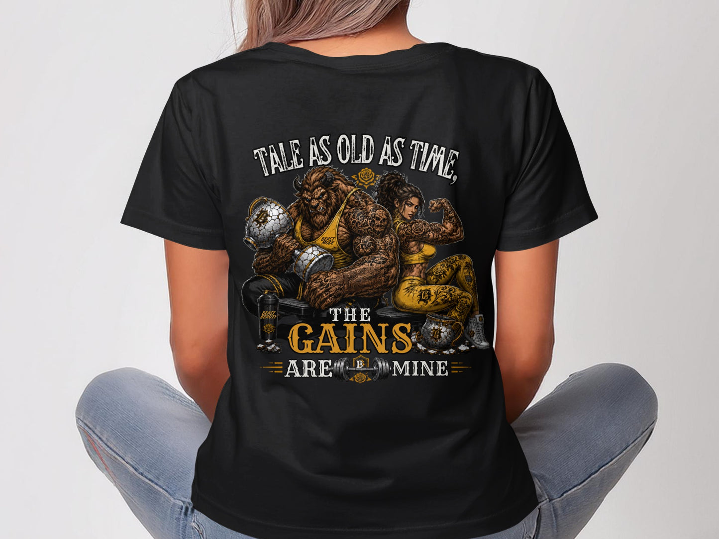 Gaston and Belle in a stylized, muscular pose holding weights, with text "Tale as old as time, the gains are mine".