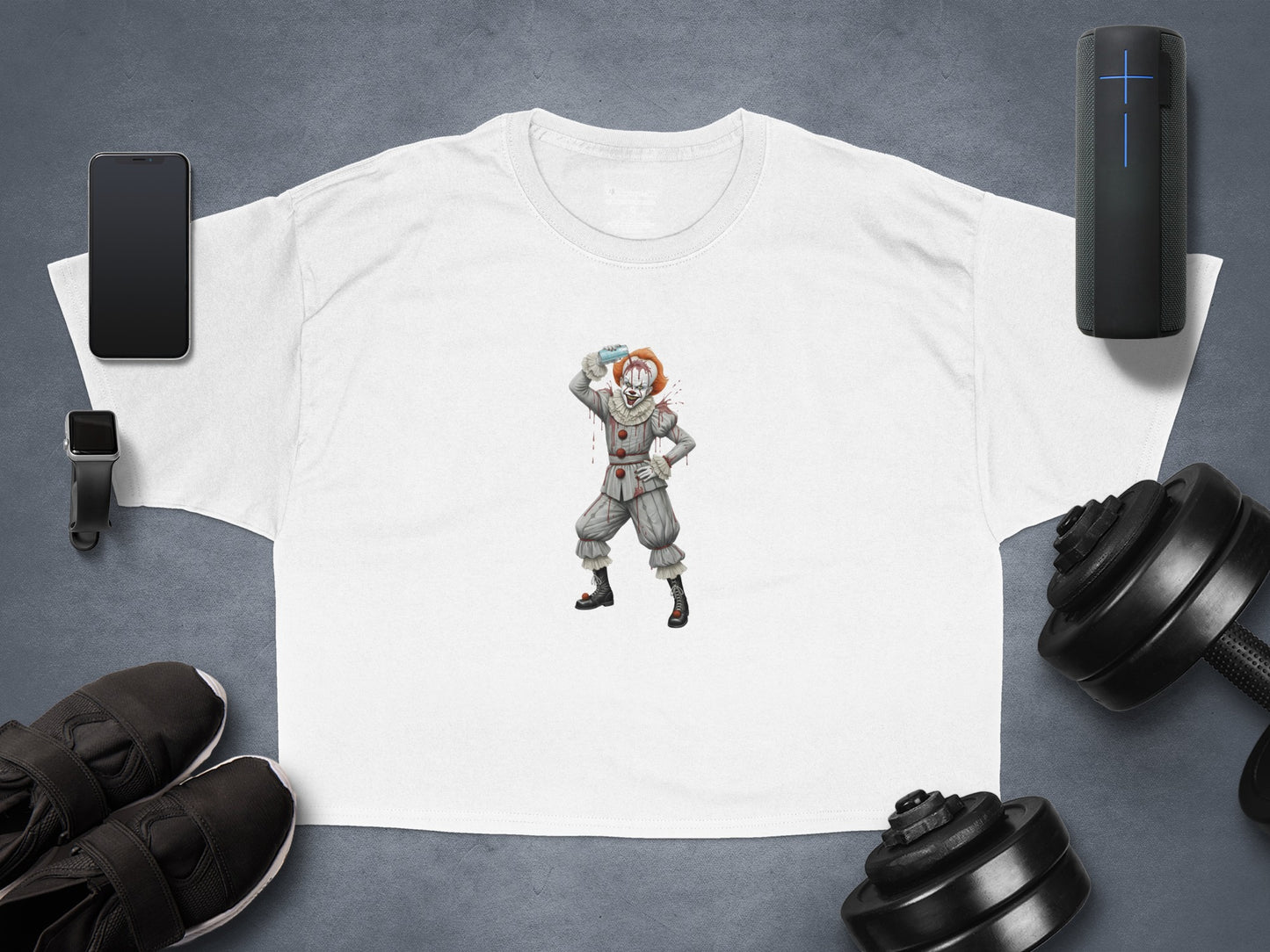 White t-shirt featuring a menacing clown with a balloon and an umbrella.