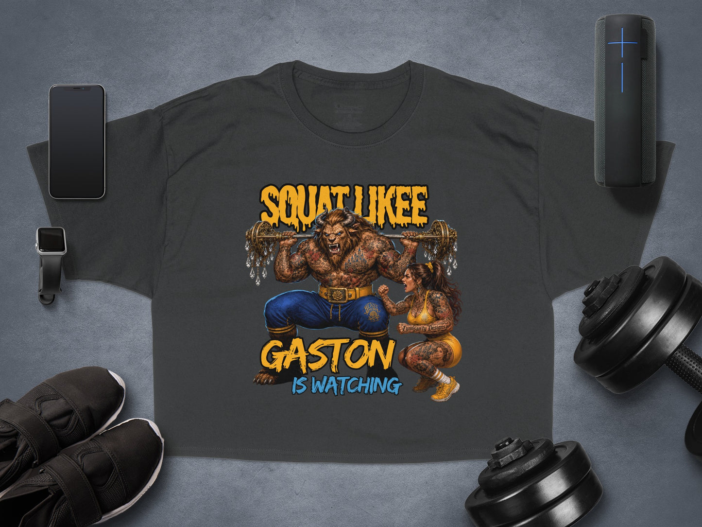 T-shirt with Gaston lifting weights, text "SQUAT LIKE GASTON IS WATCHING."