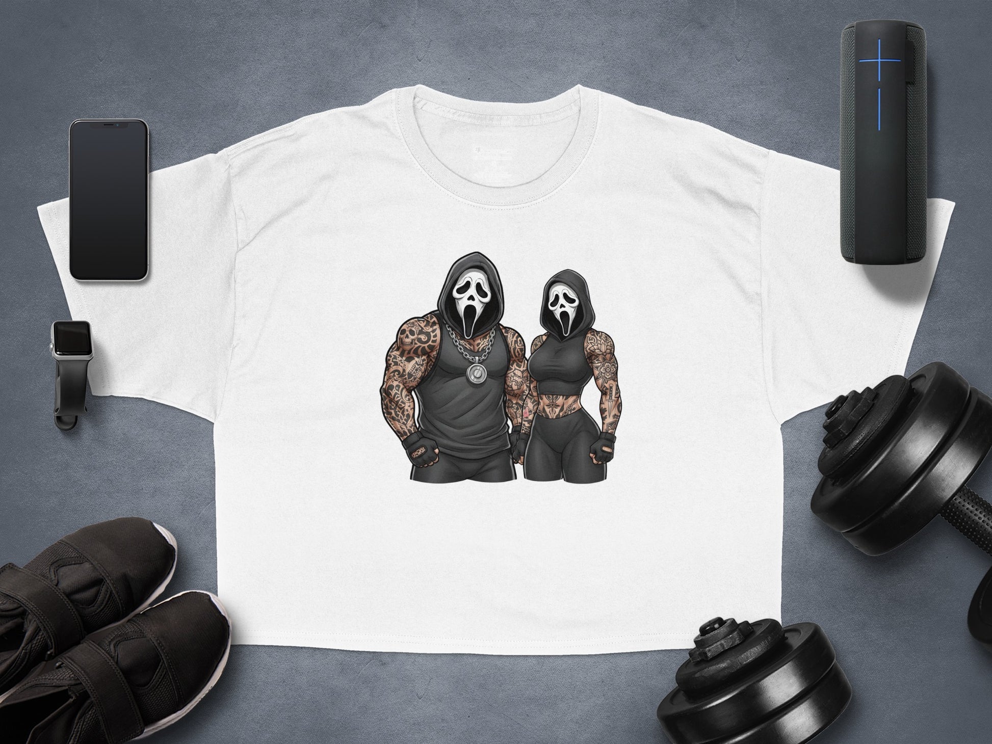 Graphic tee with Ghostface masks and muscular tattooed bodies.