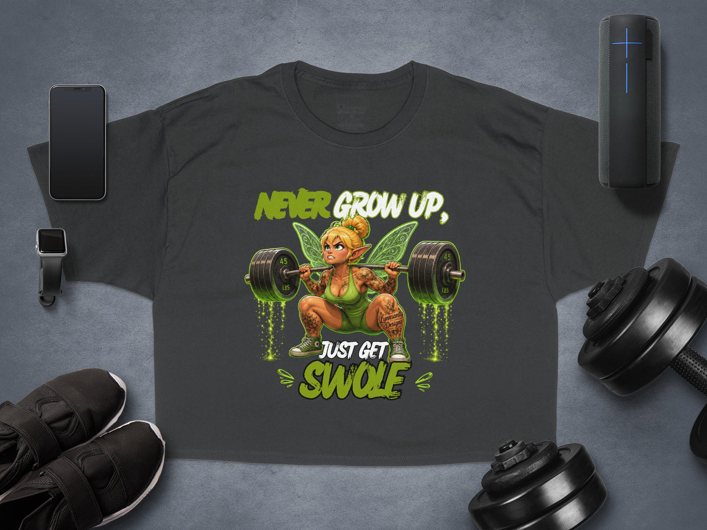 T-shirt with fairy lifting weights, text "NEVER GROW UP, JUST GET SWOLE".