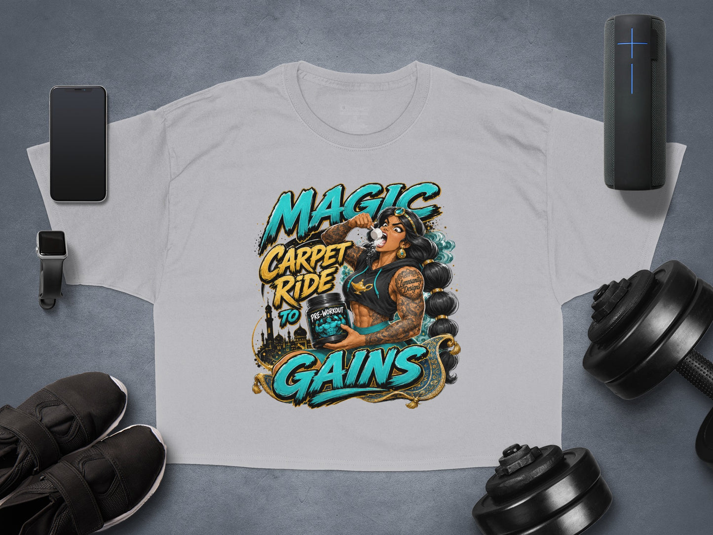 T-shirt with "Magic Carpet Ride to Gains" text and illustration of woman lifting weights.