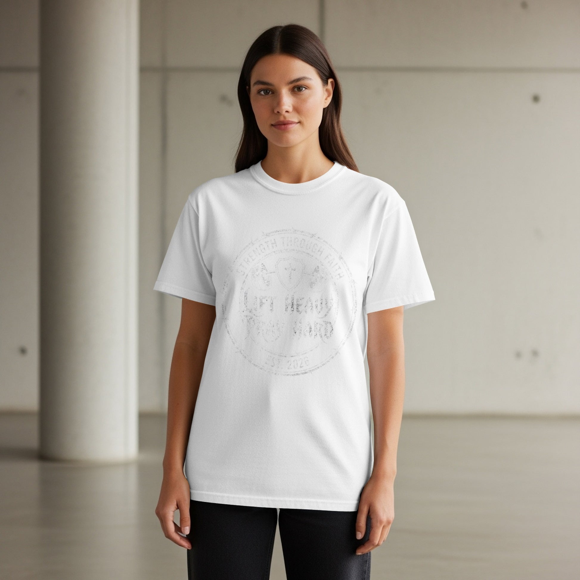 White t-shirt with circular "Strength Through Faith" graphic on chest.
