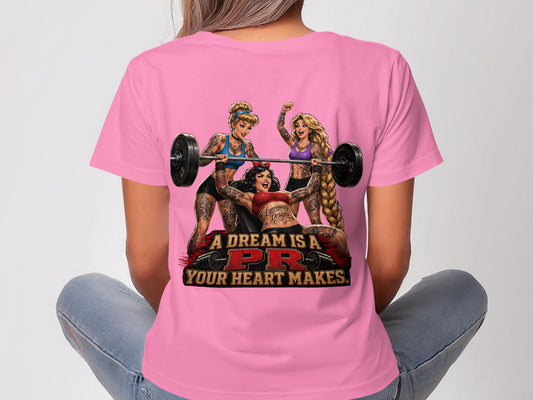 Three women lifting weights with "A DREAM IS A PR YOUR HEART MAKES" text.