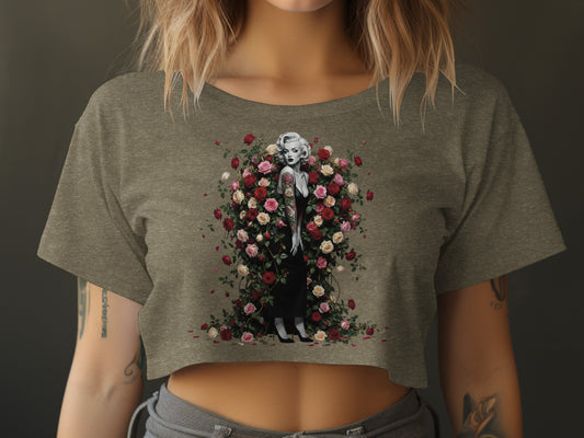 Marilyn Monroe with flowers printed on a grey crop top.
