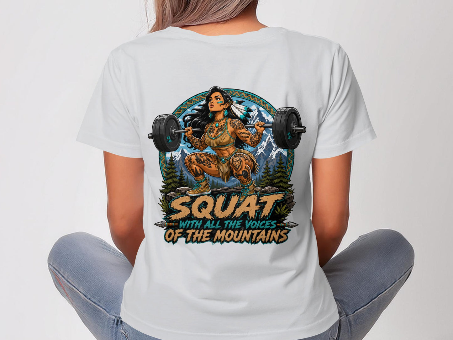 Tattooed woman performing a barbell squat with mountainous background and text.