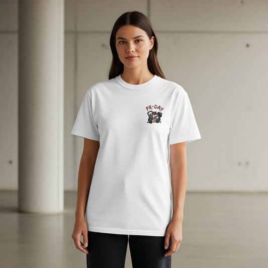White t-shirt with "PR-DAY" and cartoon weights graphic on chest.