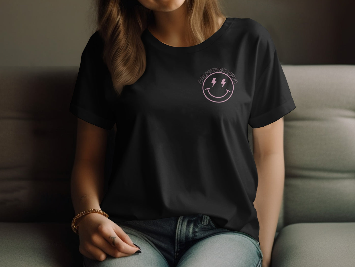 Black t-shirt with pink smiley face and lightning bolt graphic.