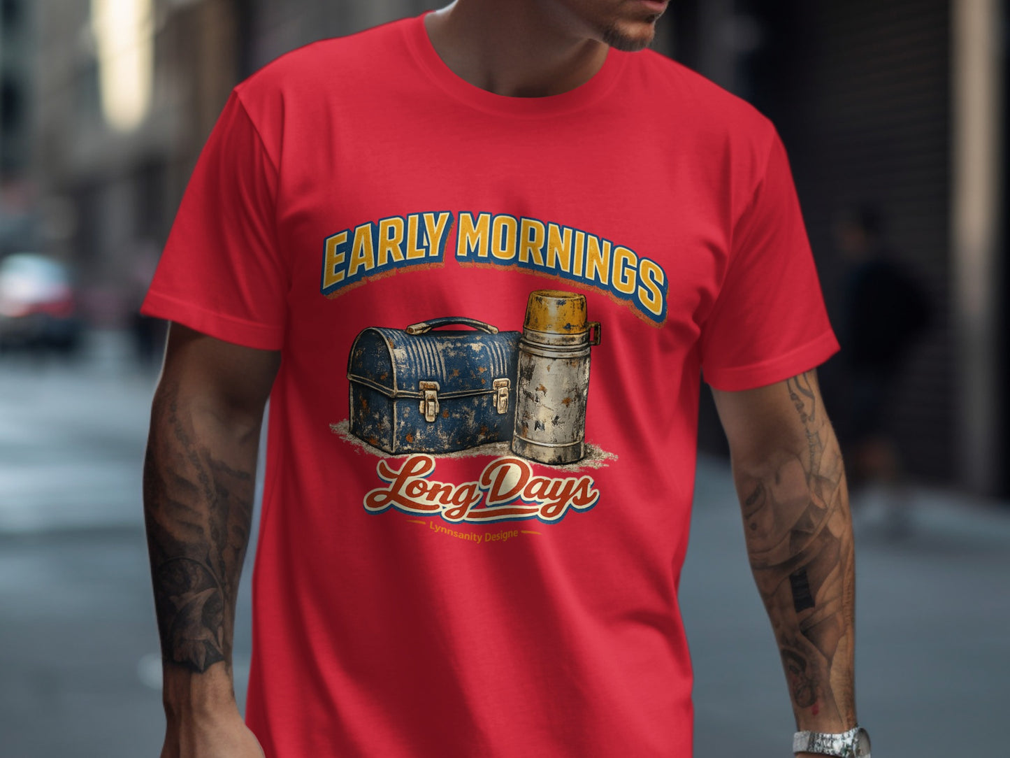 Red t-shirt with "Early Mornings Long Days" text and vintage lunchbox illustration.