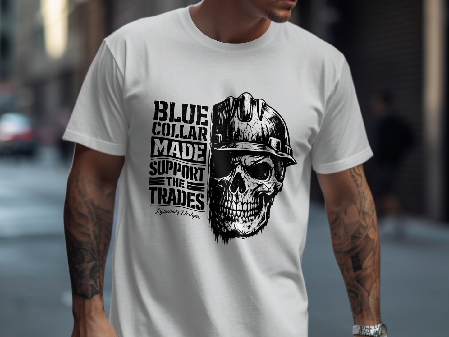White t-shirt with skull wearing hard hat and "BLUE COLLAR MADE SUPPORT THE TRADES" text.