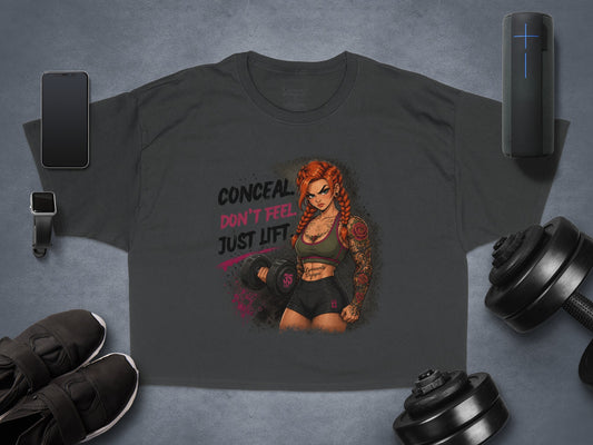 Dark grey t-shirt with tattooed woman lifting weights and text "CONCEAL DON'T JUST LIFT".