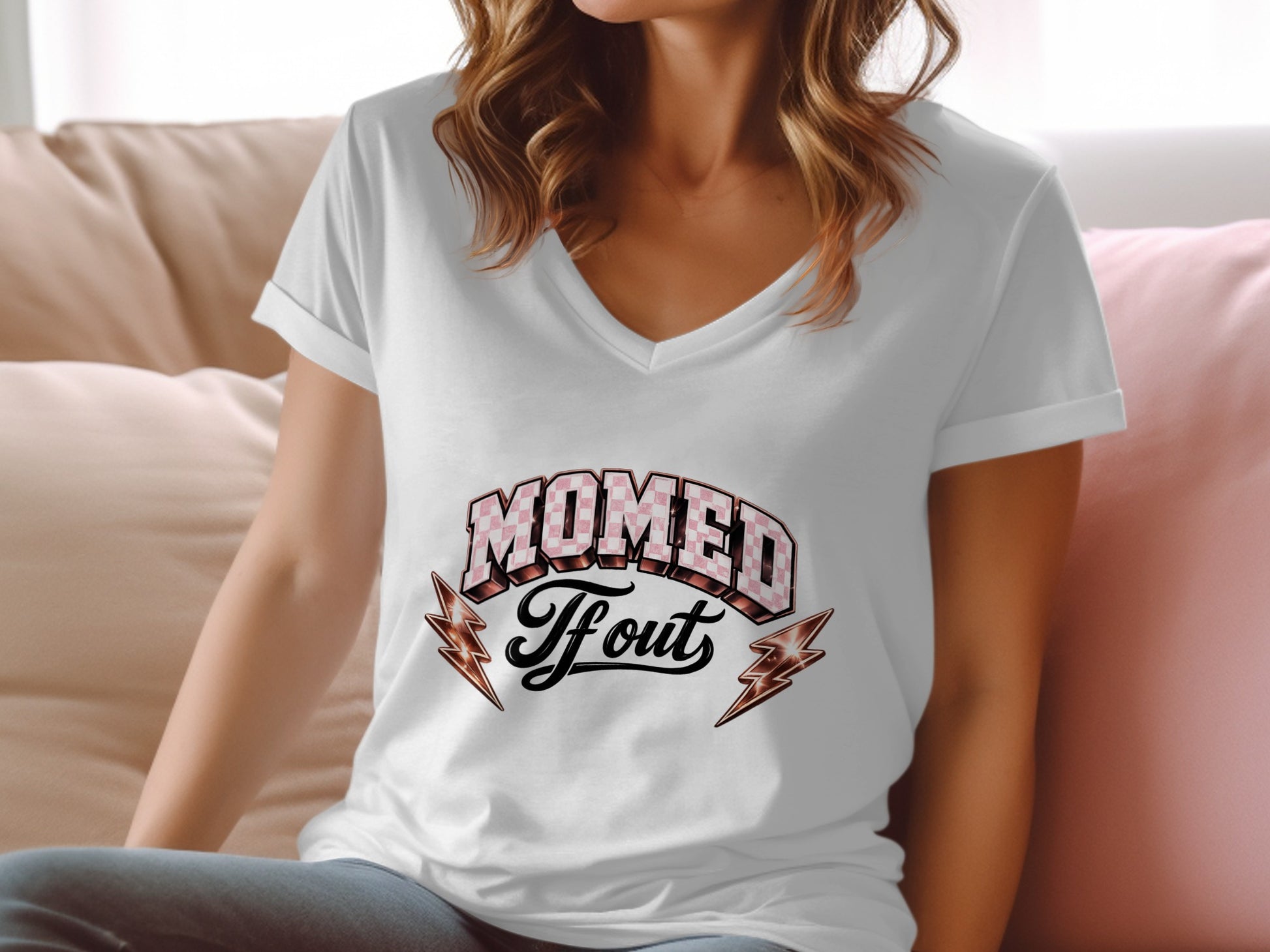 White v-neck t-shirt with "Mom'd Out" and lightning bolt graphic.