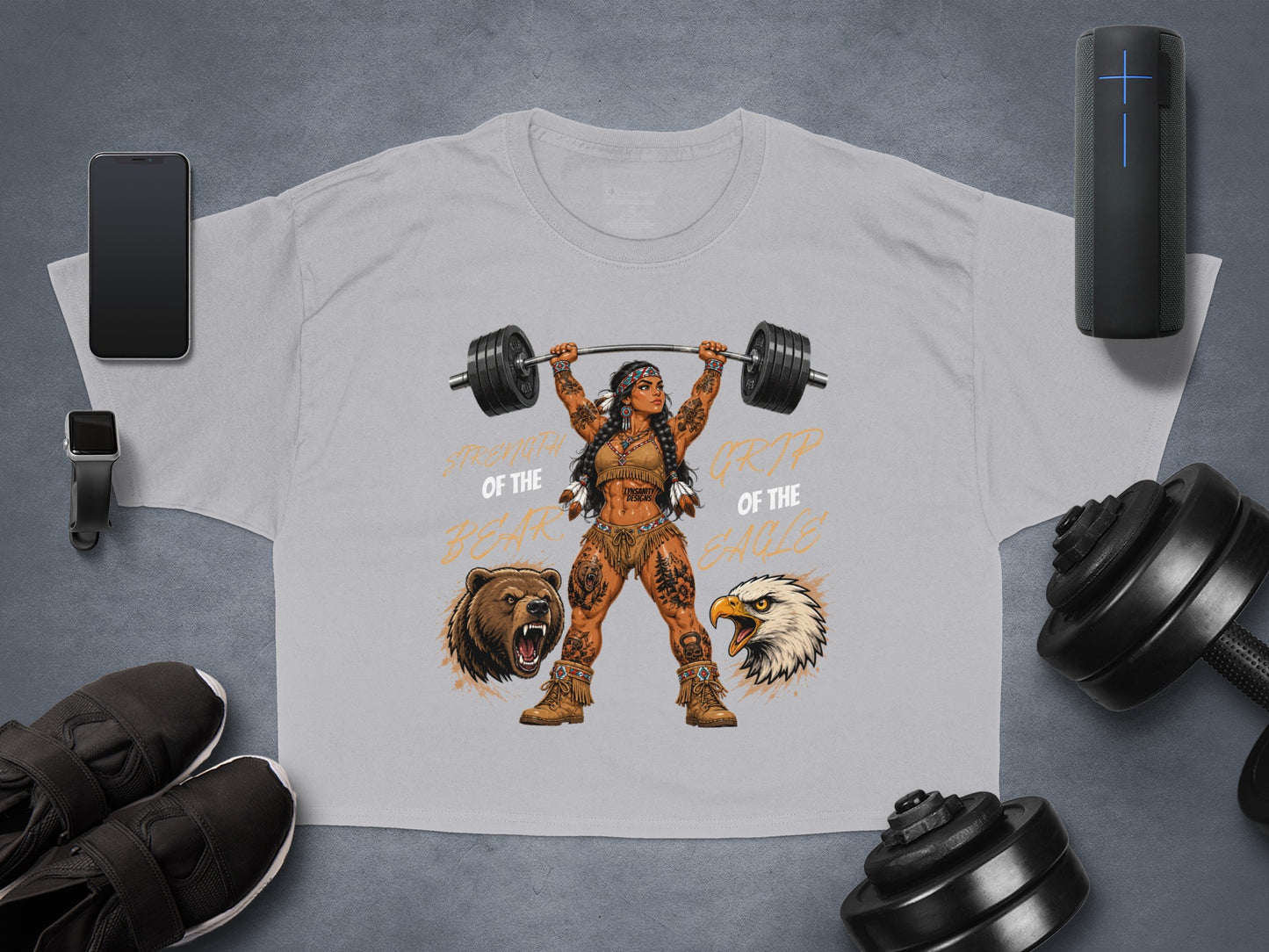 T-shirt with woman lifting barbell, bear and eagle graphics, and text.