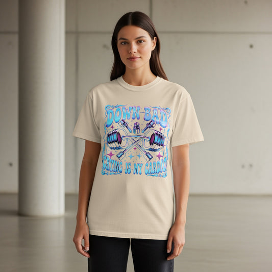 Cream t-shirt with "DOWN BAD GYM IS MY CARDIO" text and barbell graphic.